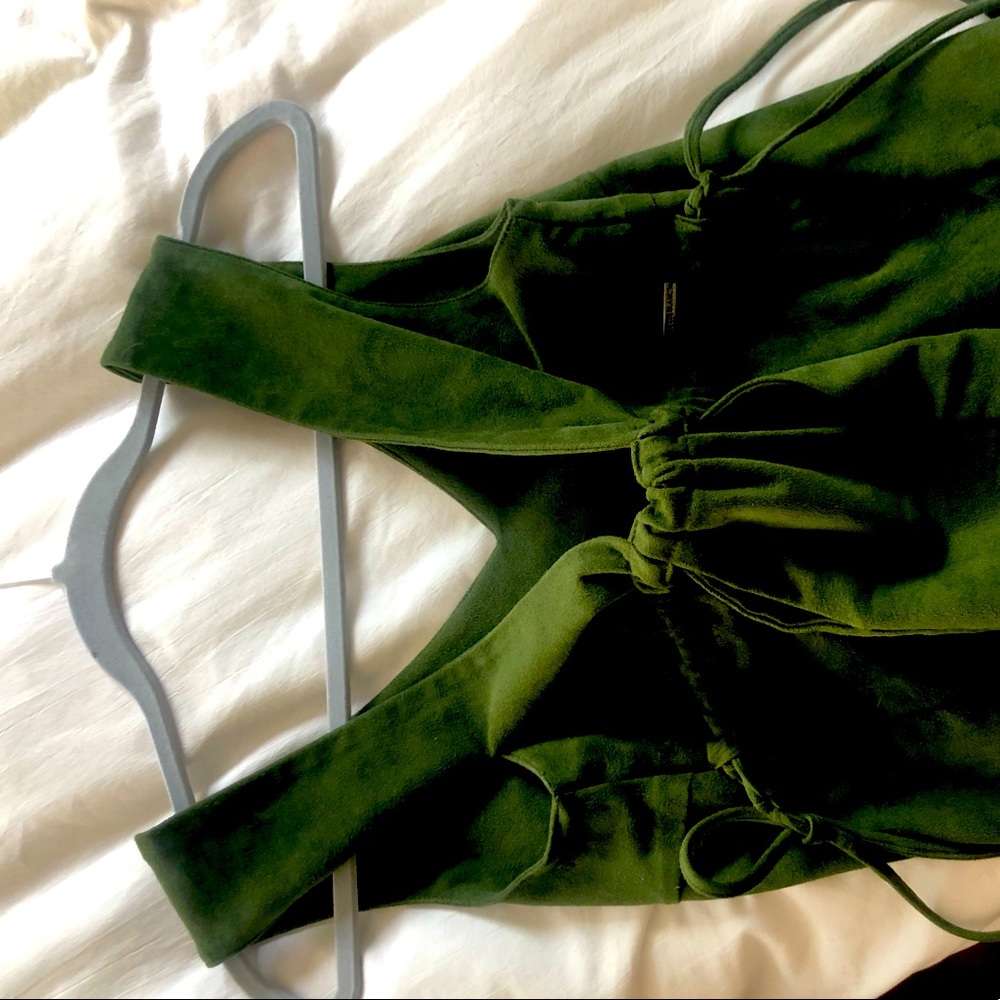 Green top suede material with adjustable sides waist.